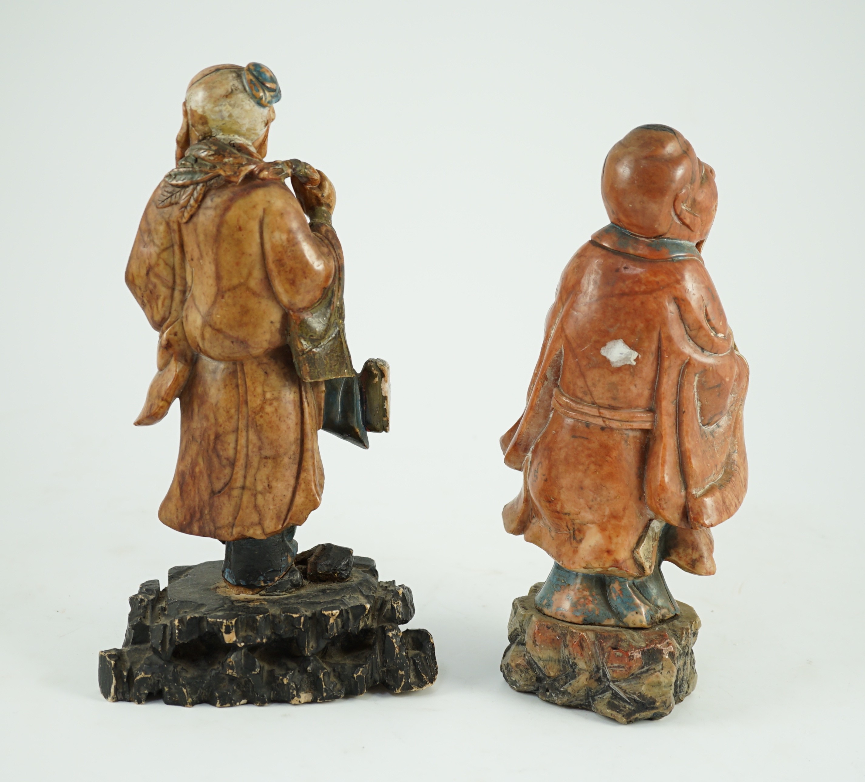 Two Chinese soapstone figures of Shou Lao, 18th century, 23cm and 24.5cm high